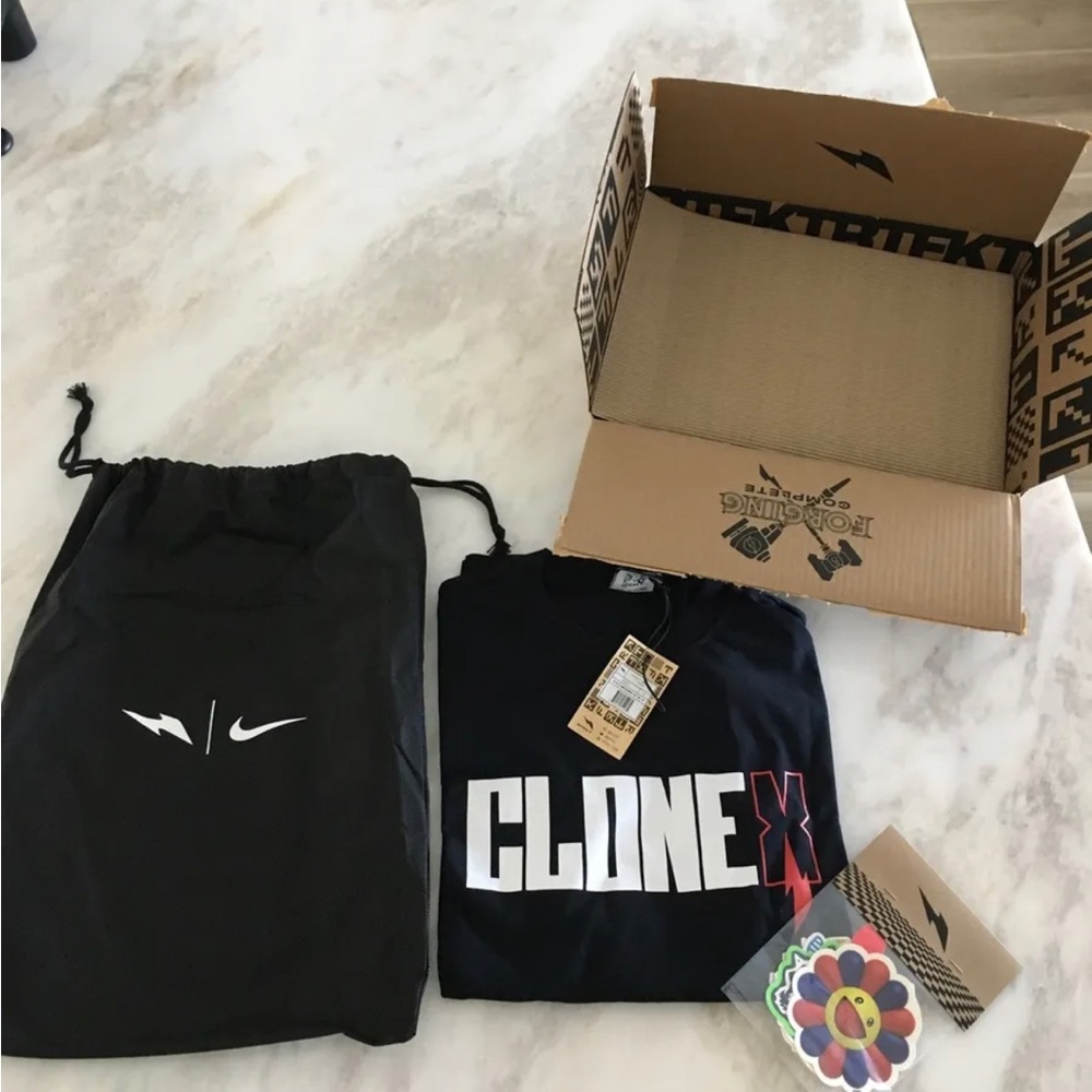 This is a brand new RTFKT Clone-X x Nike Genesis T-Shirt